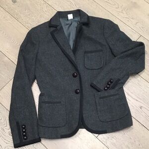 Woman’s J.Crew grey wool blazer. Size 6. Lined. Black trim. Pockets. Really cute